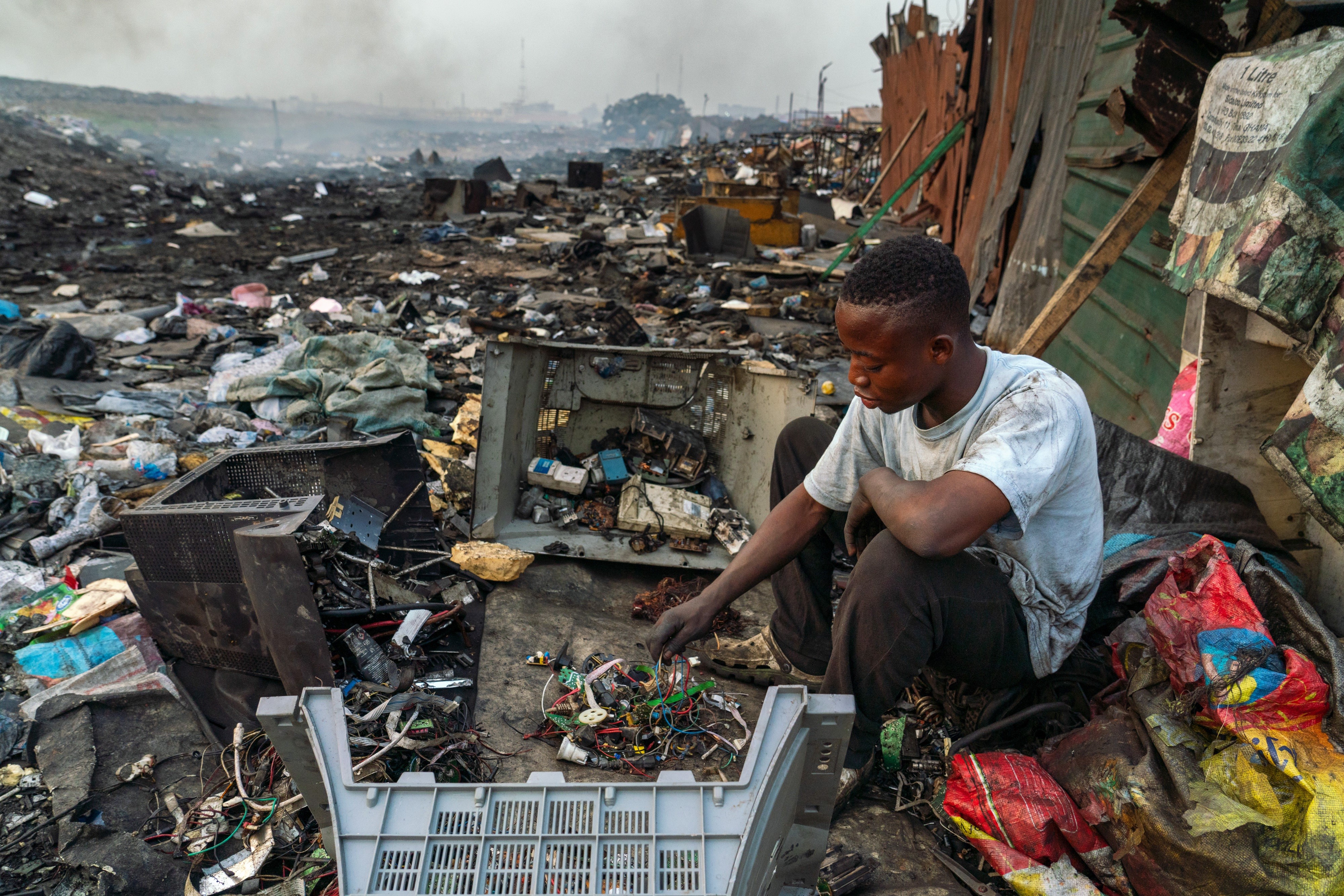 E-waste being dumped in a vulnerable overseas community.
